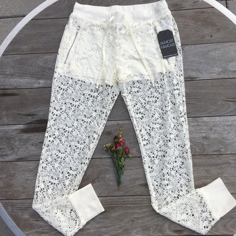 Brand New With Tags Lace legging with shorts under